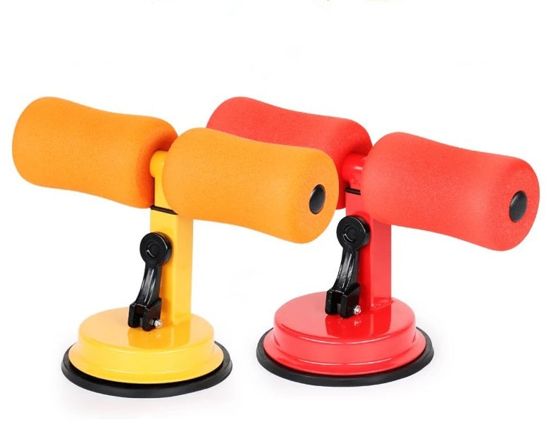 Pair of orange and red ab crunch machines on a white background
