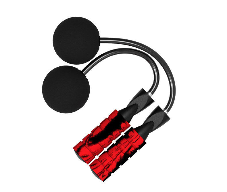 Red and black jump rope with two black handles on a white background