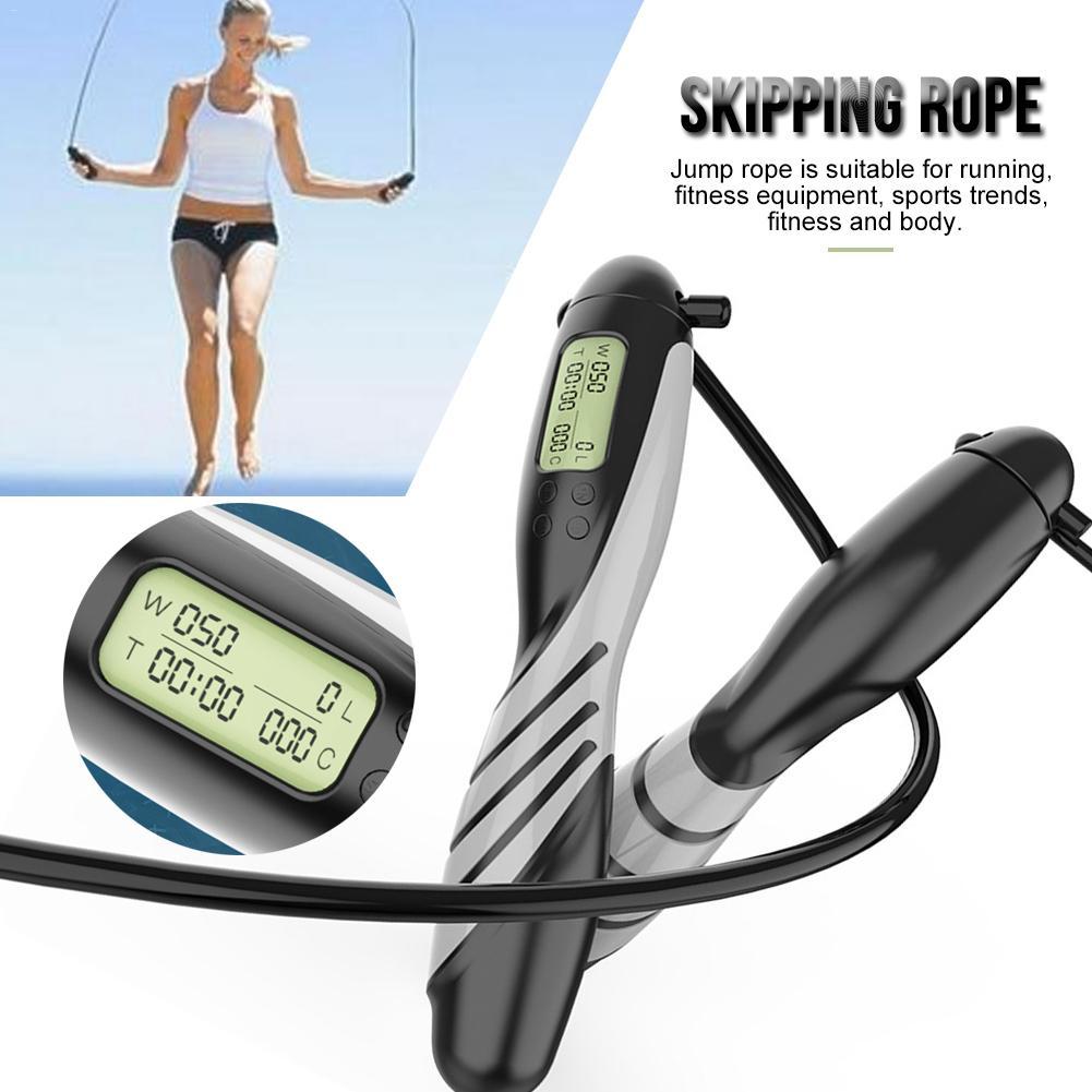 Digital skipping rope with a digital display and a person using it in the background.