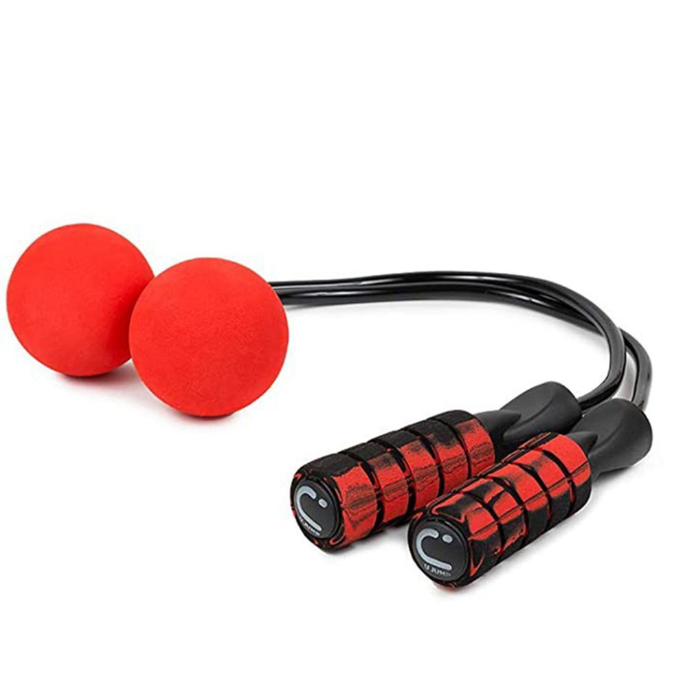 Red jump rope with black handles on a white background