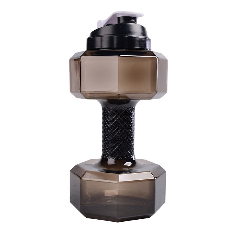 Decorative dumbbell-shaped bottle with a textured base on a white background