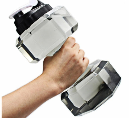 Hand holding a pair of silver dumbbells on a white background