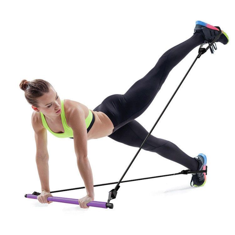 Woman exercising with resistance bands on a white background