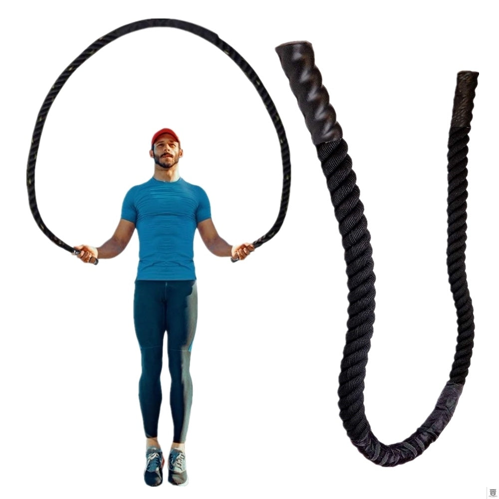 Person holding a large black battle rope on a white background