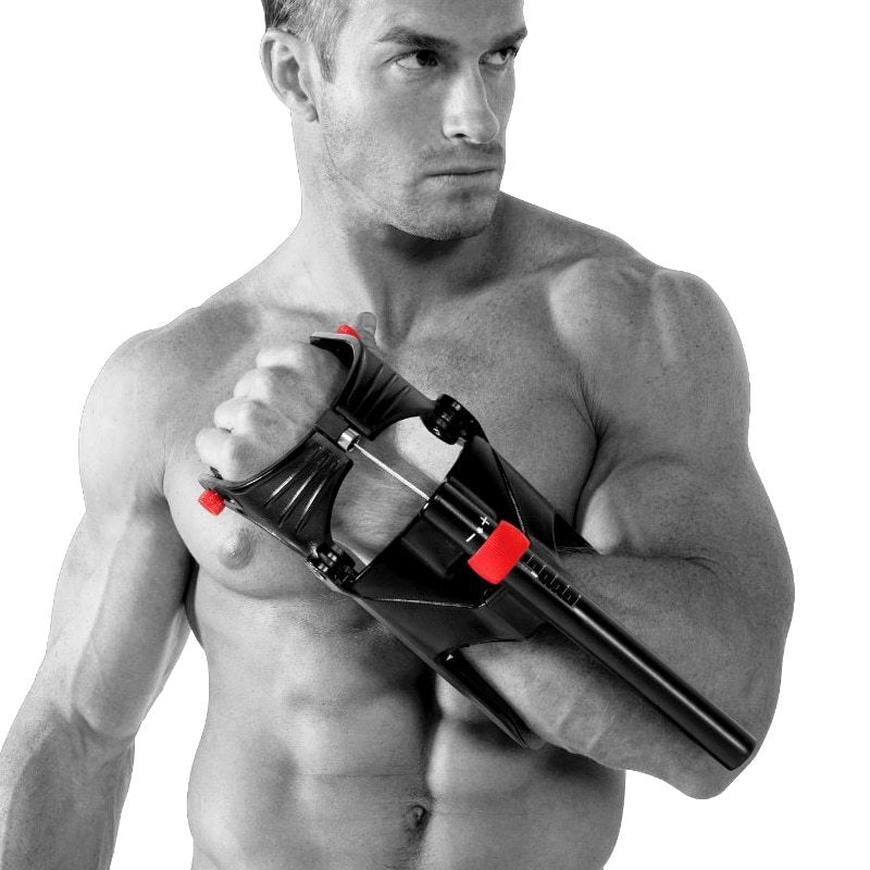 Man holding a black and red exercise device against a white background