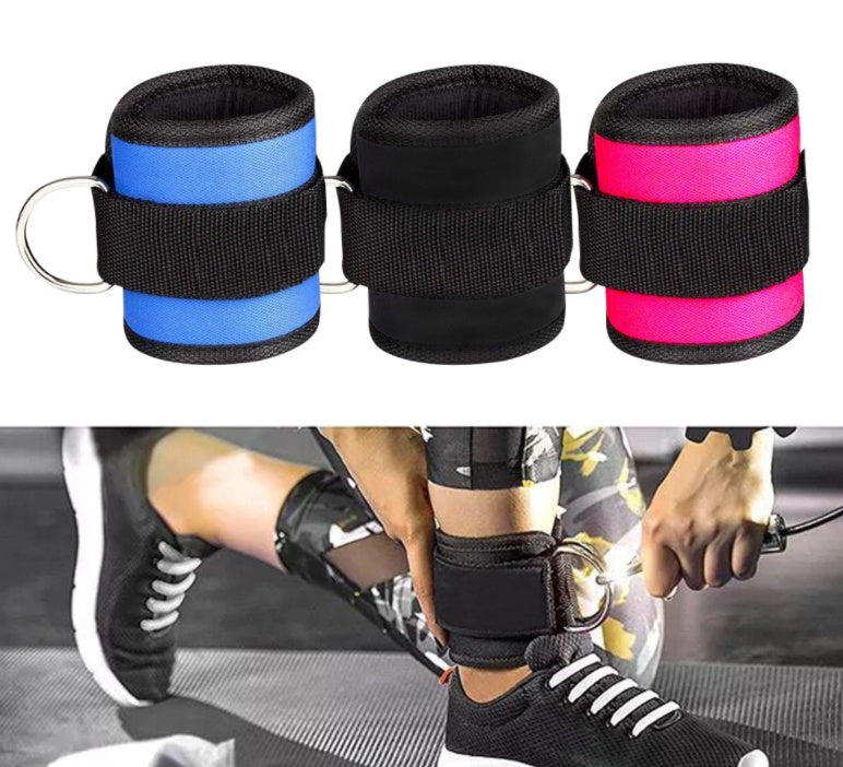 Three wrist straps in blue, black, and pink with a person using them on a gym floor.