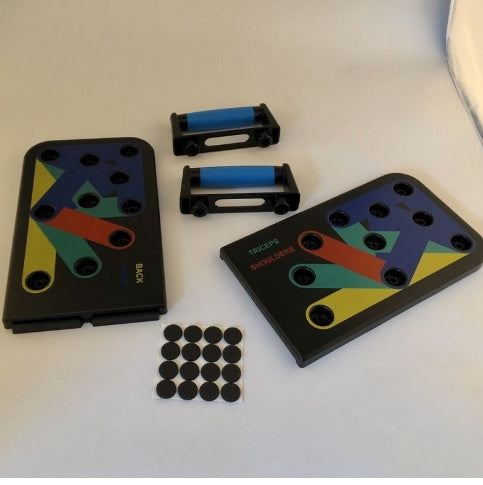 Colorful game pieces and components on a white surface